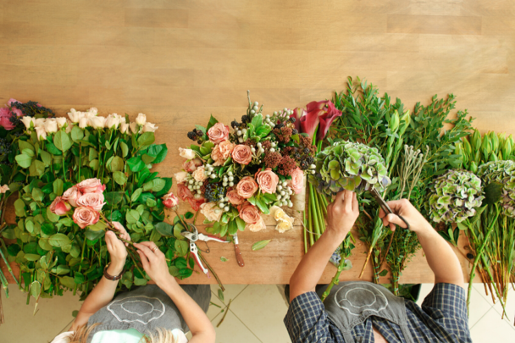 Arranging Flowers - Cutler Real Estate